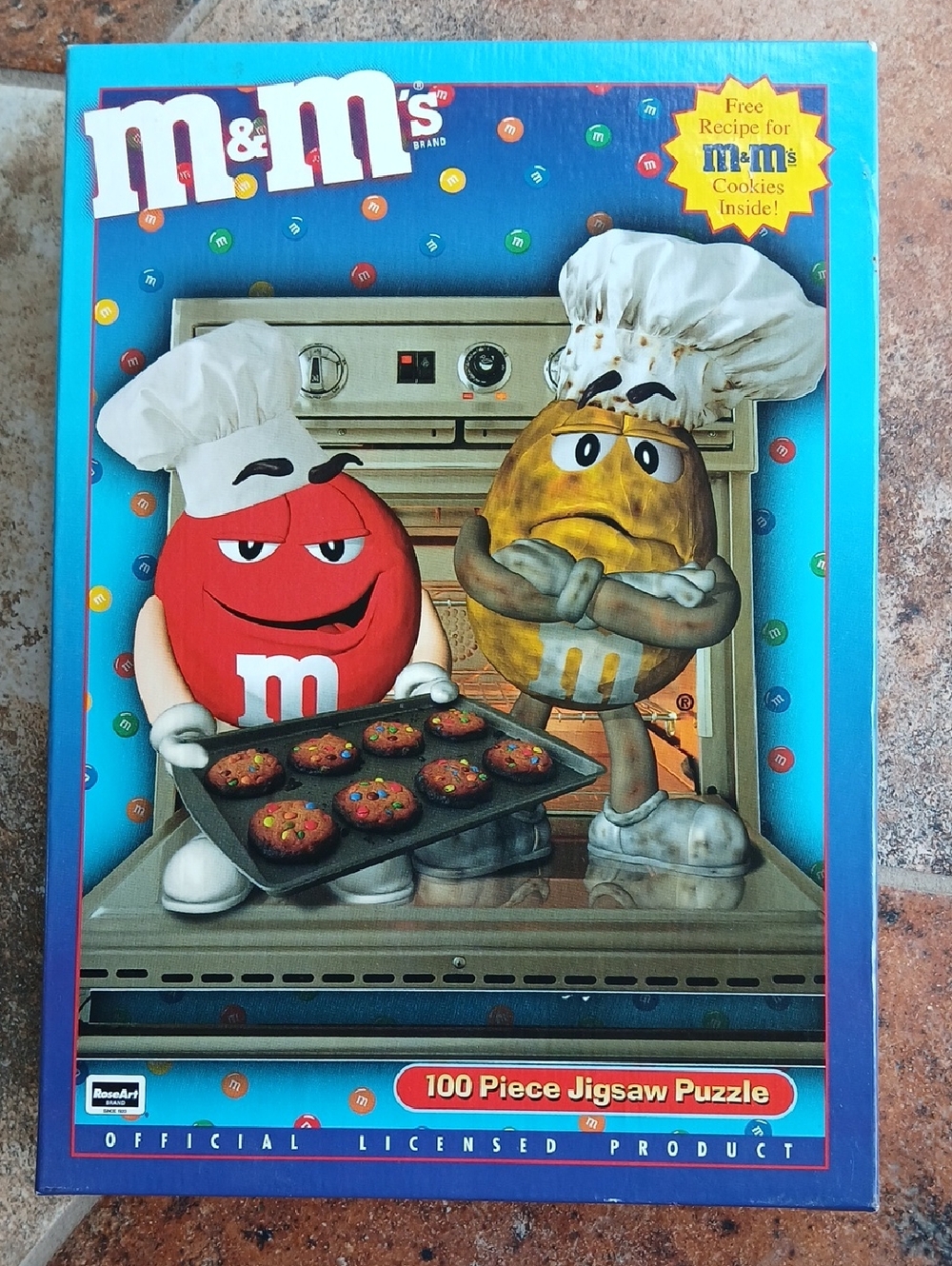 M&M'S Puzzle Featuring Red and Yellow Candy Chefs